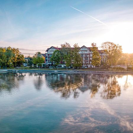 Willa Port Ostróda Dış mekan fotoğraf The lake at the campus of the University of Applied Sciences and Medical University of Southern Tyrol